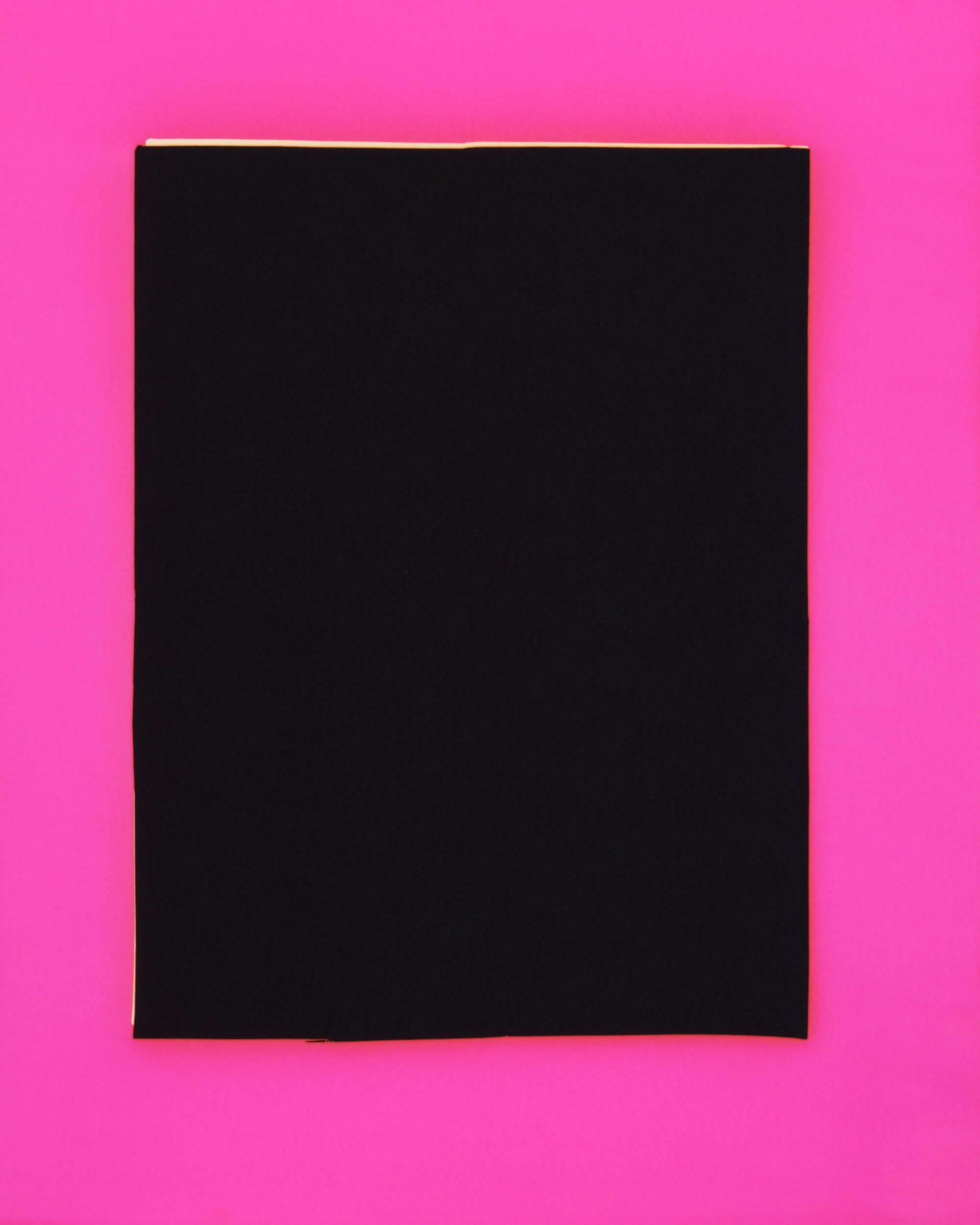 A large, solid black square is centered on a bright pink background. The edges of the black square are straight, and a thin border of the pink background is visible around the square.